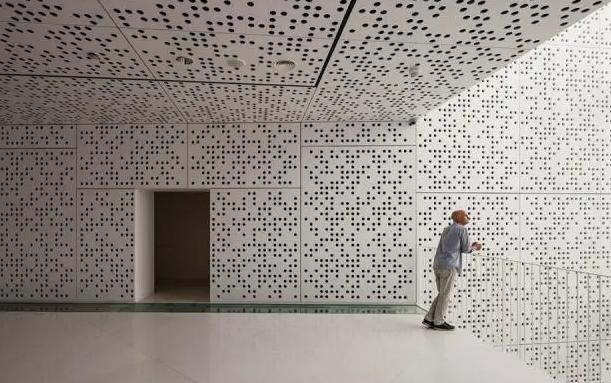 Perforated aluminum wall panels